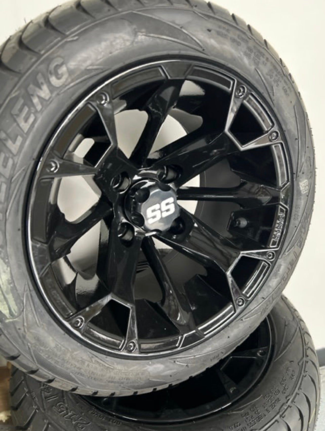 12" "Blackjack" gloss black wheel & tire combo